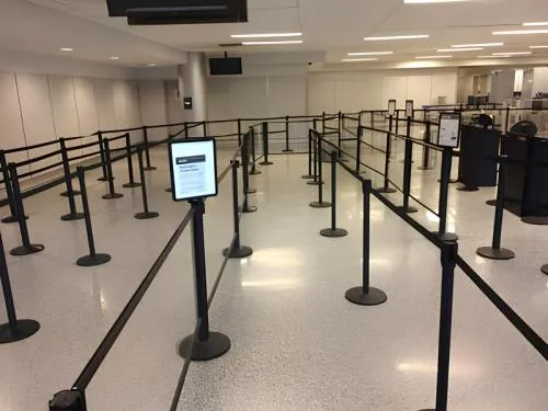 Black crowd control stanchion 40 inches tall with retractable belt for guiding lines at Chicago events