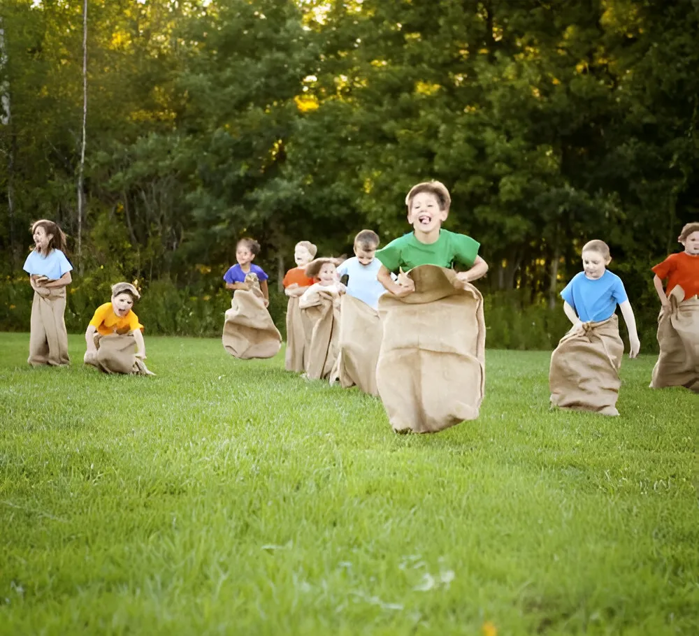 Set of 8 burlap potato sack race sacks for classic picnic games, available for rental in Chicago.