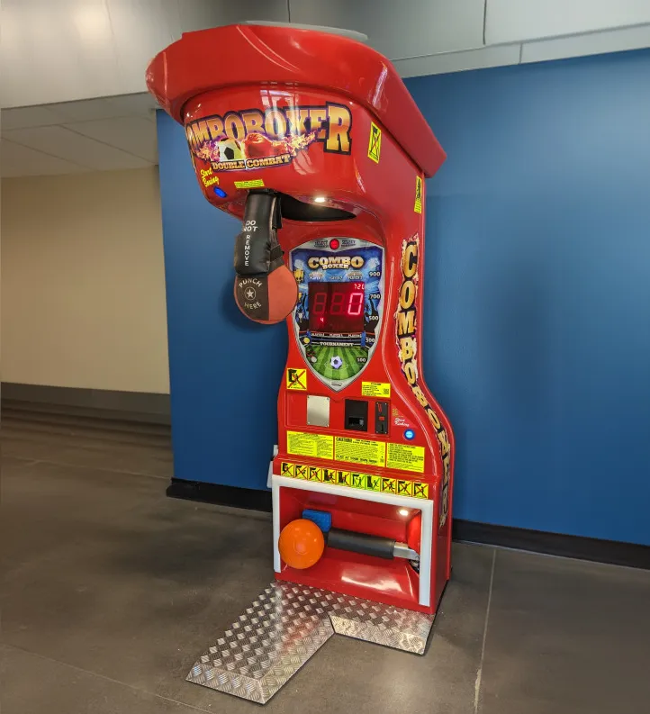 Combo Boxer Arcade rental with punching bag and soccer ball scoring game for Chicago events