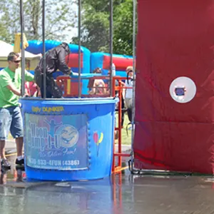 Trailer-mounted water dunk tank rental for Chicago fundraisers, carnivals, and parties
