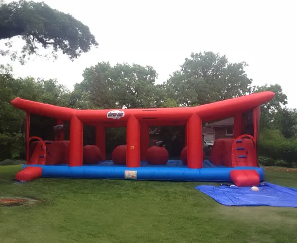 Wipe Out Big Red Ball inflatable challenge game rental for Chicago events by AMJ Spectacular Events