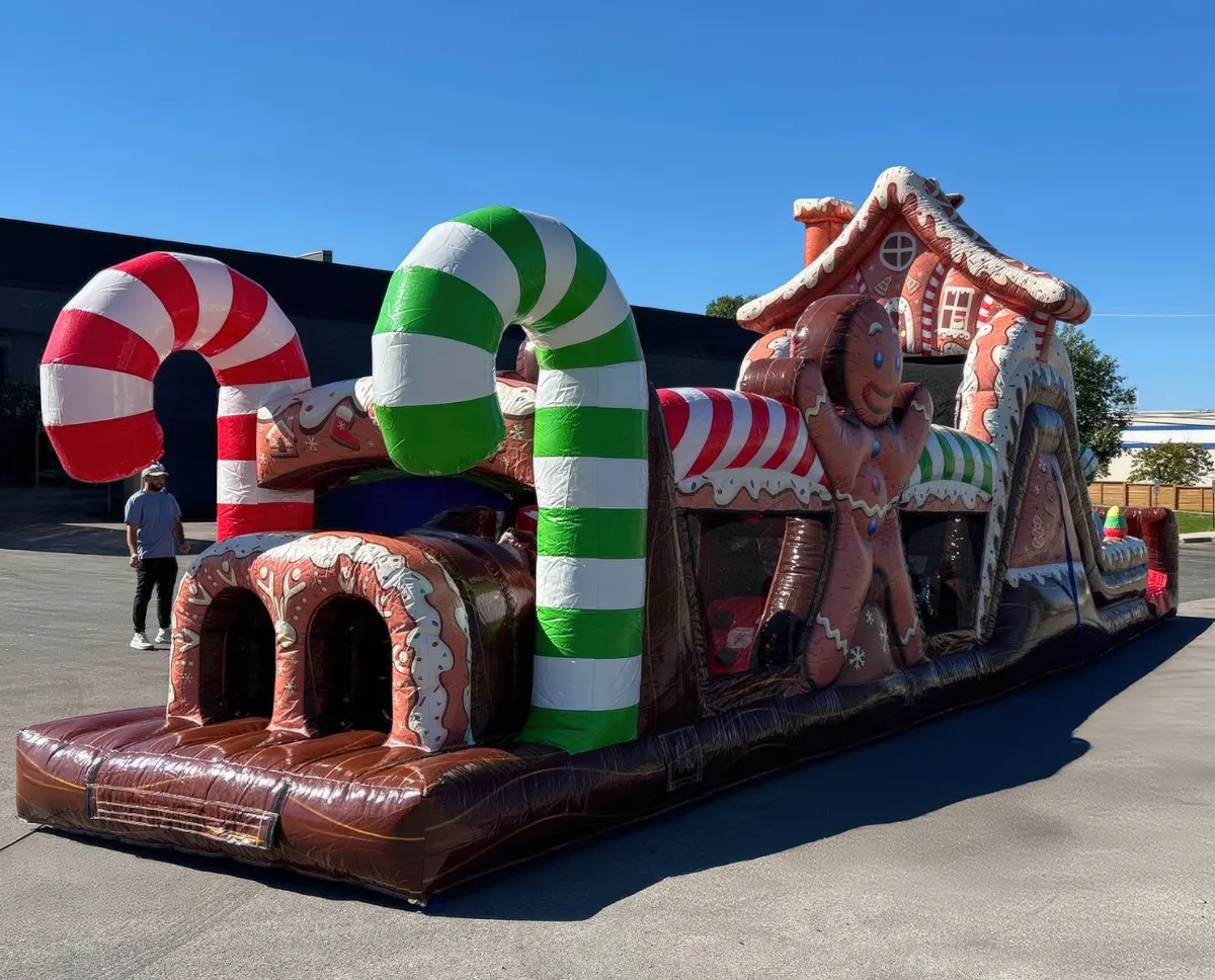 Giant 47ft Gingerbread House inflatable obstacle course rental for holiday events in Chicago