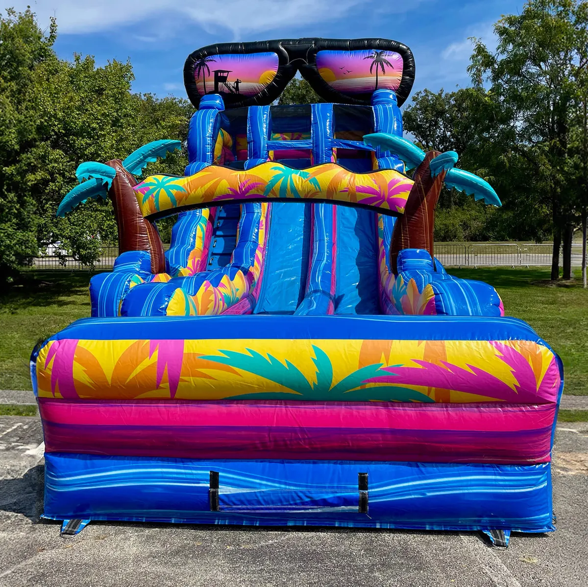 Island Flow tropical-themed inflatable double lane 18-foot slide from AMJ Spectacular Events in Chicago