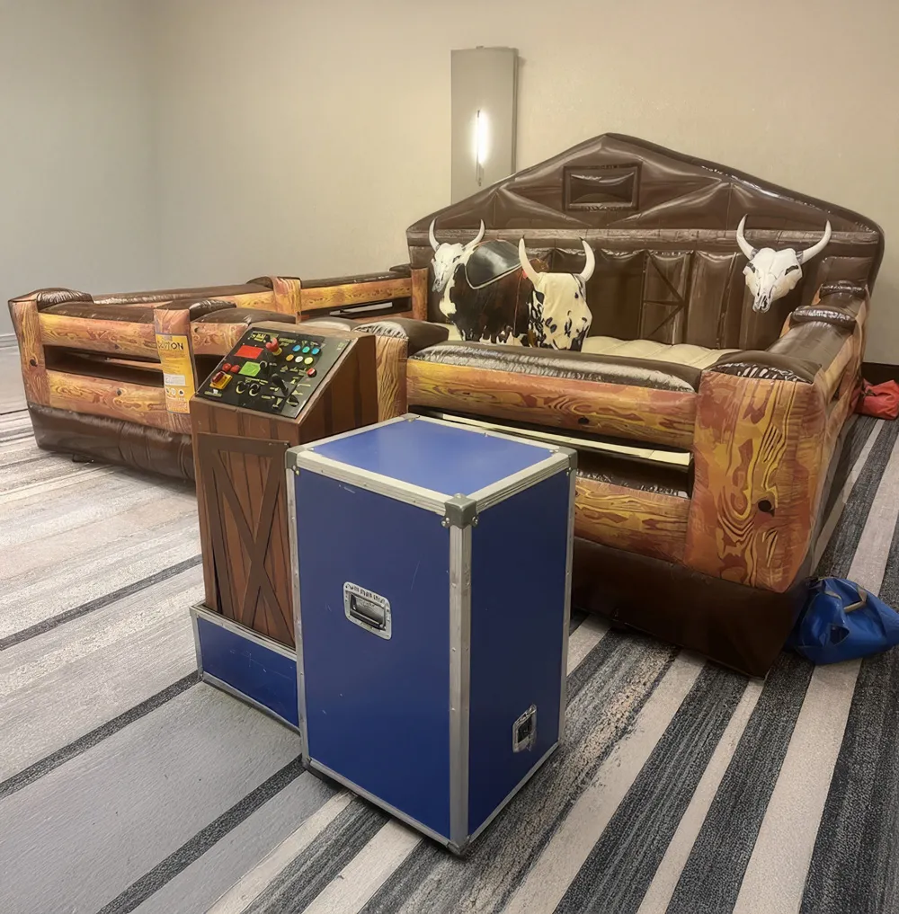 Mechanical Western Bull Ride rental with soft foam head and inflatable safety floor for Chicago events