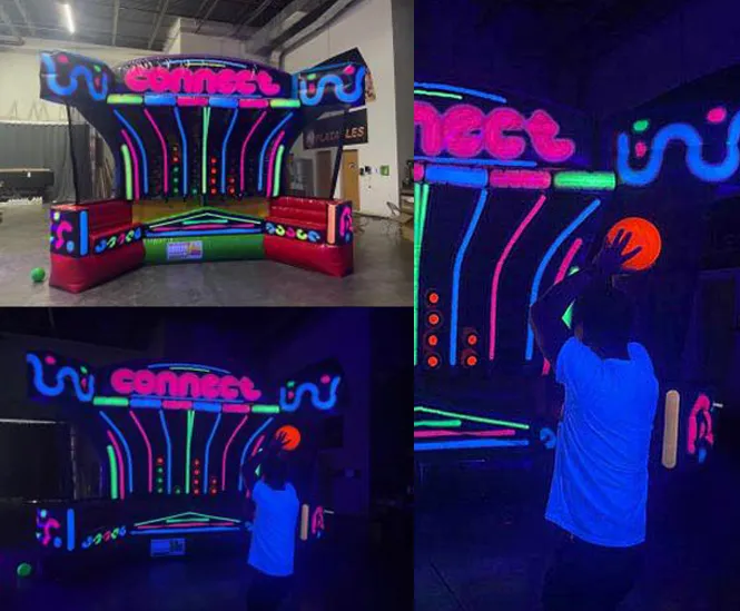 Giant Connect 4 Basketball LED glow-in-the-dark inflatable game with black lighting for Chicago events