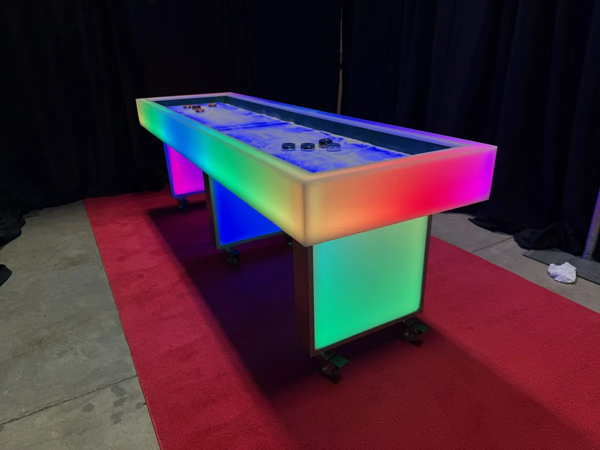 LED Acrylic 10' Shuffle Board rental glowing with colorful lights for Chicago events