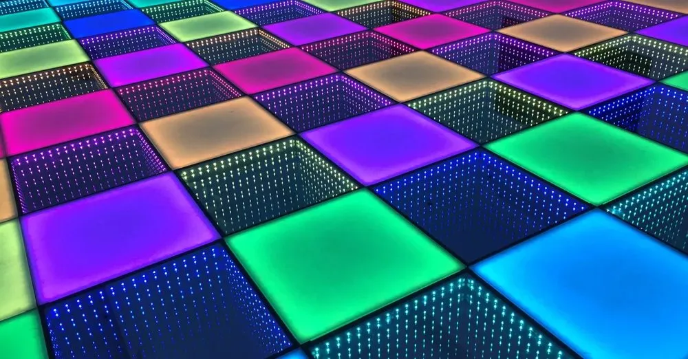 LED dance floor with glowing checkerboard pattern for a Chicago wedding or corporate event