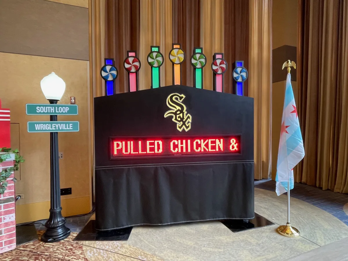 Chicago White Sox Score Board rental with lit-up spin wheels and backlit SOX sign for events