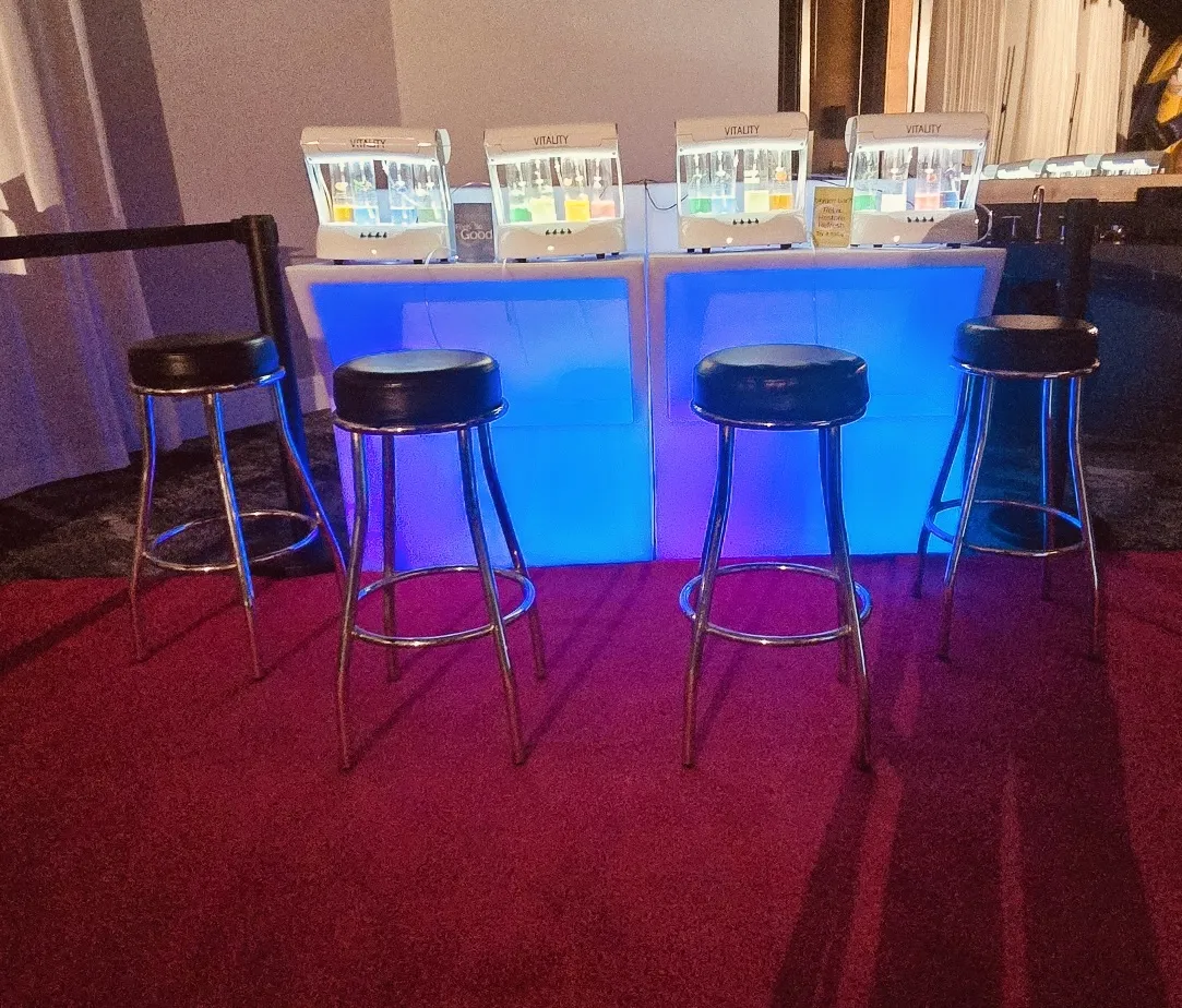 Oxygen Bar rental with four flavor stations, glowing LED bar, and bar stools for Chicago events