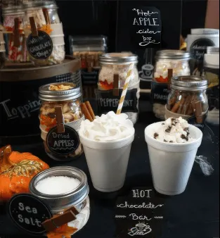 Hot Apple Cider Bar rental with toppings and warm cider dispenser for a Chicago holiday party