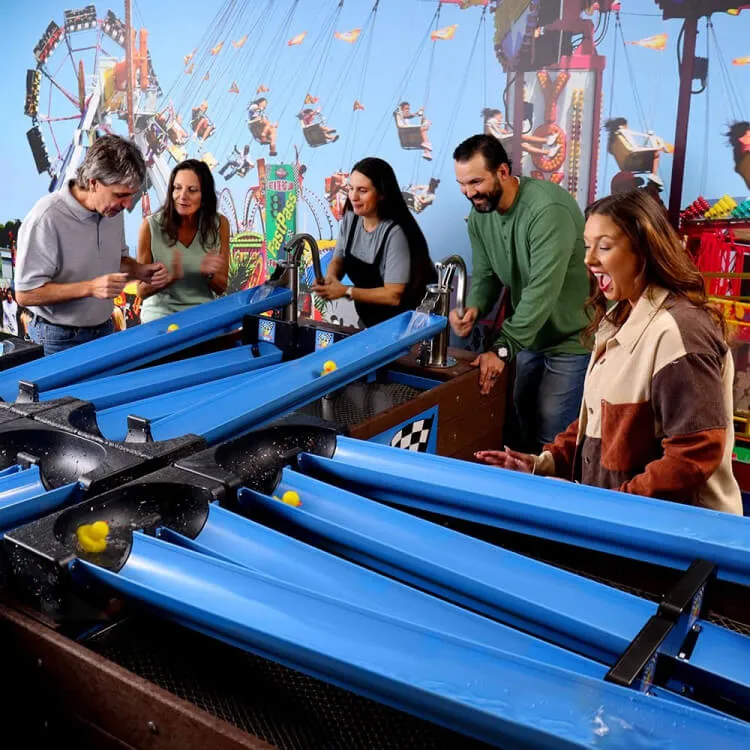 Duck Race interactive carnival water game rental with pump handles and trough for events in Chicago