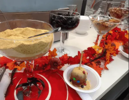 Taffy Apple Station with caramel apples and assorted toppings for events in Chicago