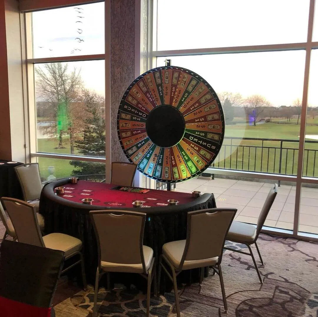 LED Money Wheel casino game rental with lit bill denominations for Chicago casino night events