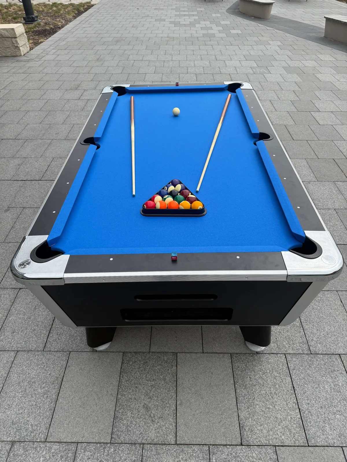 Classic pool table rental with cue sticks and billiard balls for Chicago events