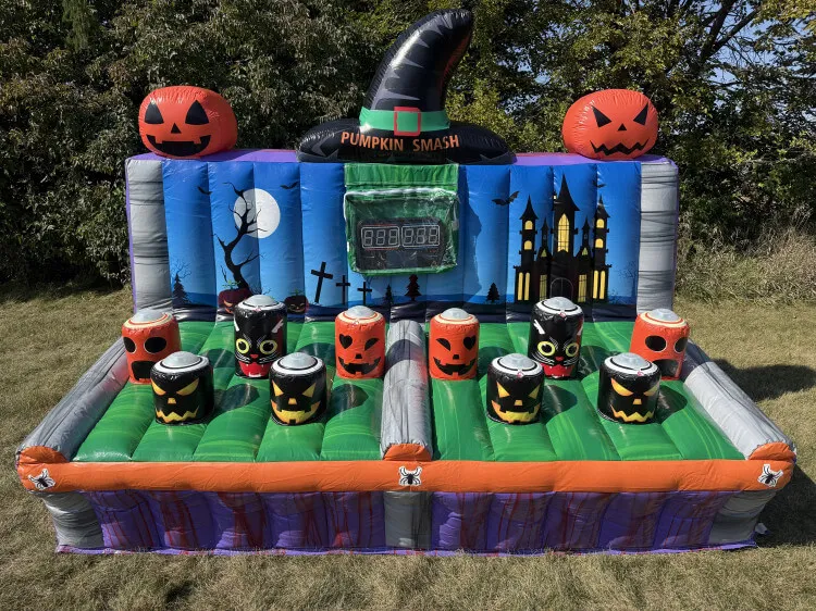 Pumpkin Smash Light Speed inflatable game with lit pumpkin targets and Halloween-themed artwork for fall events