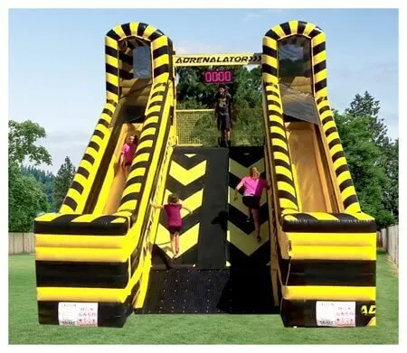 Adrenalator Attraction rental with two racing conveyor belts and slides for high-energy Chicago events