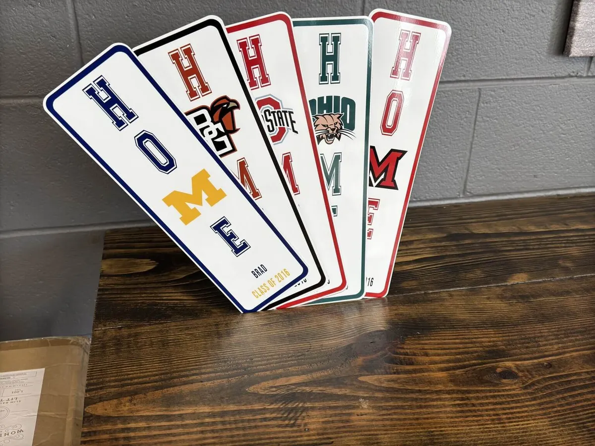 Custom organization and school signs made to order at a Chicago event by AMJ Spectacular Events