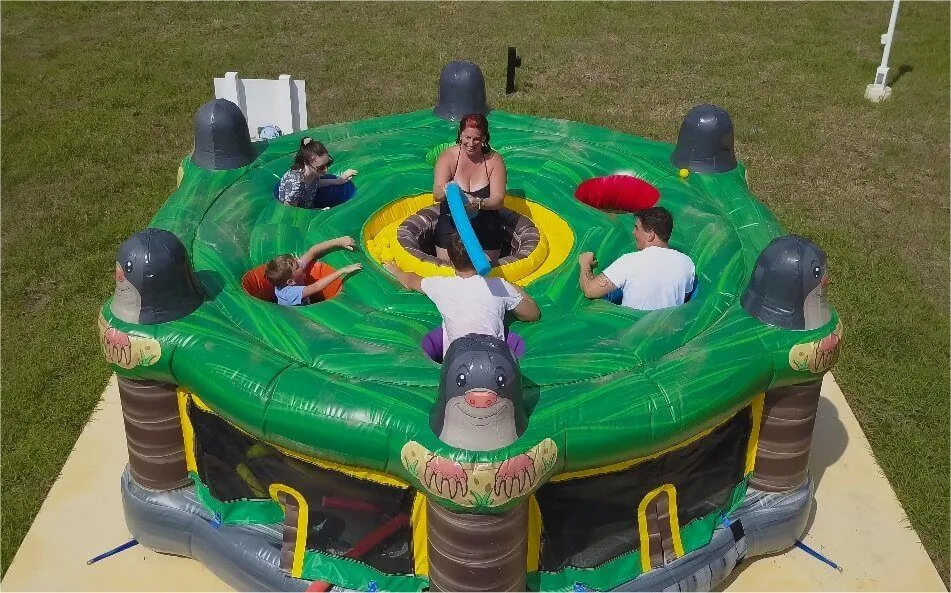 Human Whack A Mole inflatable game rental for up to 7 players at a Chicago event