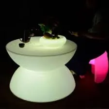 Round LED end table glowing in color, part of AMJ Spectacular Events GLOW furniture rental collection