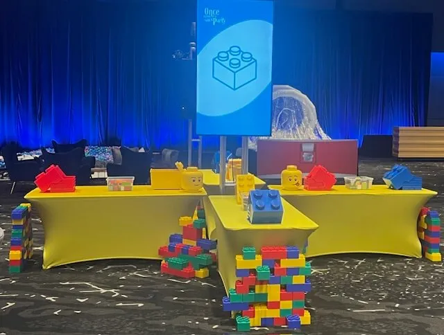 Lego Craft Play Station rental with tables, spandex covers, mixed Lego sets, and LCD screen for events