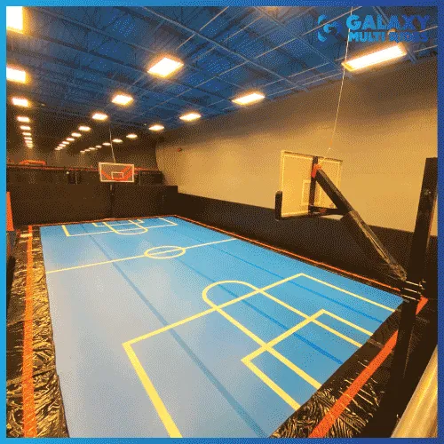 Sports Air Court rental, a 50' sealed air floor with edge padding set up for volleyball or basketball