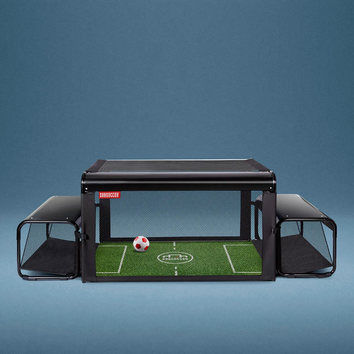 Subsoccer interactive soccer game rental with two players kicking a ball under a clear tabletop