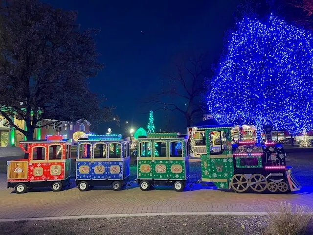 The Grand Express electric trackless train with LED-lit cars for Chicago events, festivals and parties