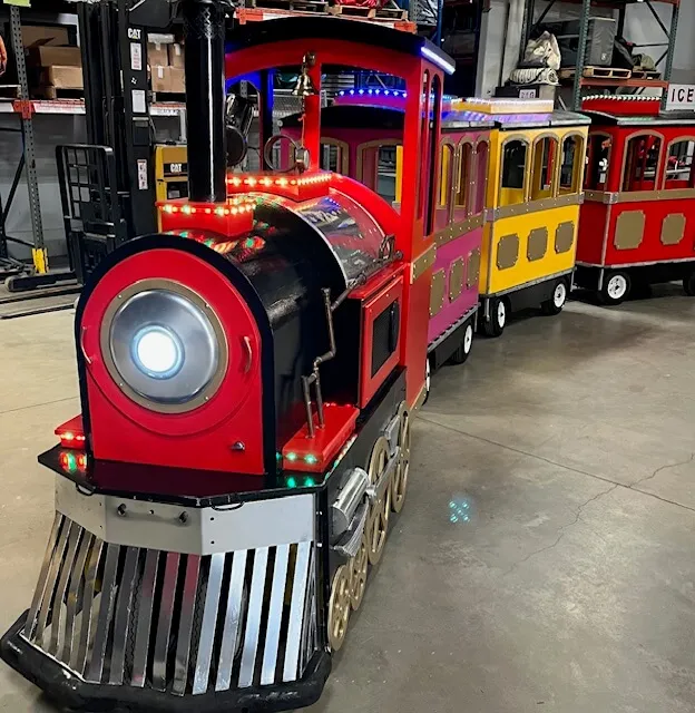 The Spectacular Express Train, an electric trackless train carrying children and adults at a Chicago event