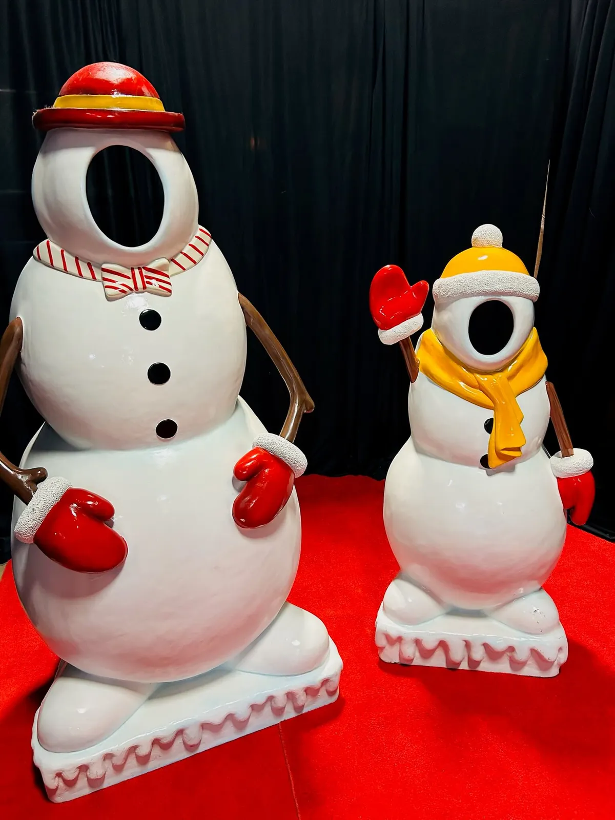 Snowman Winter theme Photo Op set with 4' and 6' snowmen featuring face cutouts and climbing stairs