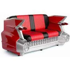 1950 Cadillac couch and love seat rental with illuminating headlights and taillights for 1950s-themed events