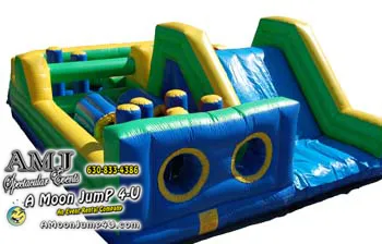50' double lane inflatable obstacle course rental with mouse holes, tackle dummies, and slide in Chicago