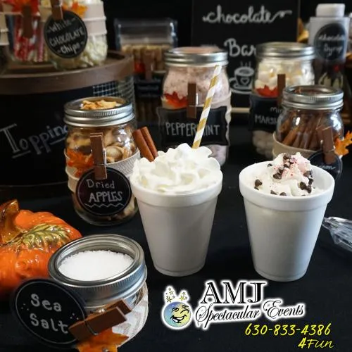 Hot Chocolate and Apple Cider Bar rental with marshmallows, sprinkles, and festive toppings from AMJ Spectacular Events