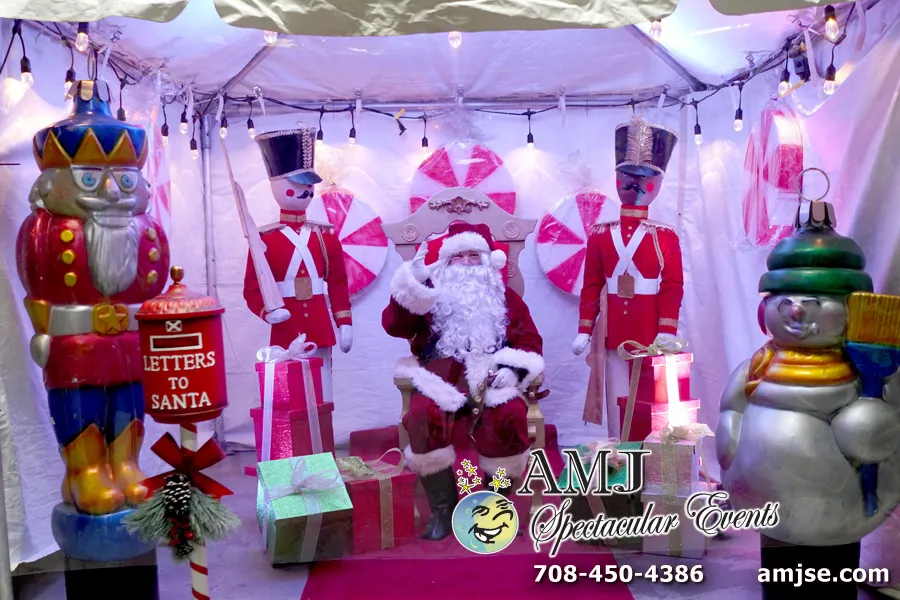 AMJ Spectacular Events traditional Christmas scene with throne, nutcrackers, giant ornaments, presents and lights