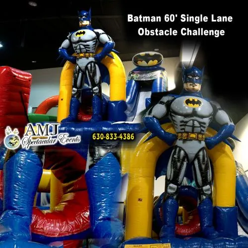Batman-themed 60-foot single lane inflatable obstacle course rental with slides and obstacles from AMJ in Chicago