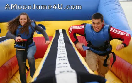 Inflatable double lane bungee run rental with two racing lanes for head-to-head competition in Chicago