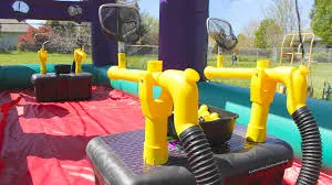 Cannonball Air Blaster inflatable 4-player foam ball game rental from AMJ Spectacular Events in Chicago
