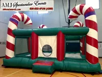 Candy Cane Holiday Jump bounce house rental with giant candy cane decorations for Chicago winter events