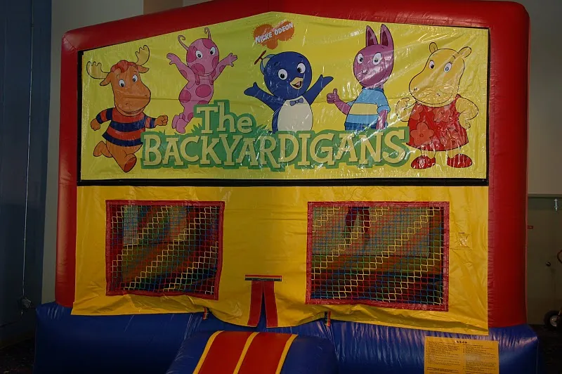 Backyardigans themed bounce house rental with colorful animal characters for kids' parties in Chicago