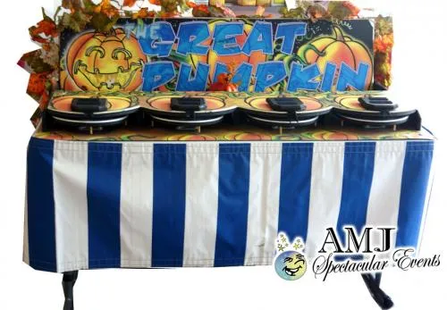 Great Pumpkin spin-to-win kiddie game rental with a colorful pumpkin patch theme for fall festivals