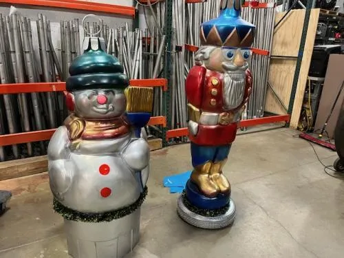 Set of two decorative holiday ornament statues available for rent from AMJ Spectacular Events in Chicago