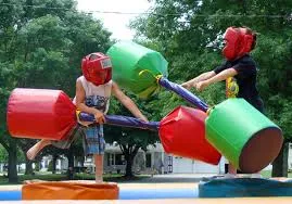 Inflatable Joust Arena rental with padded pedestals for two-player battles in Chicago