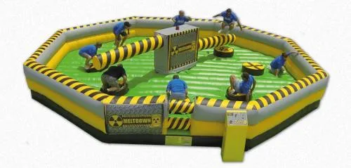 Meltdown 8-player inflatable game with spinning boom poles for Chicago events by AMJ Spectacular Events