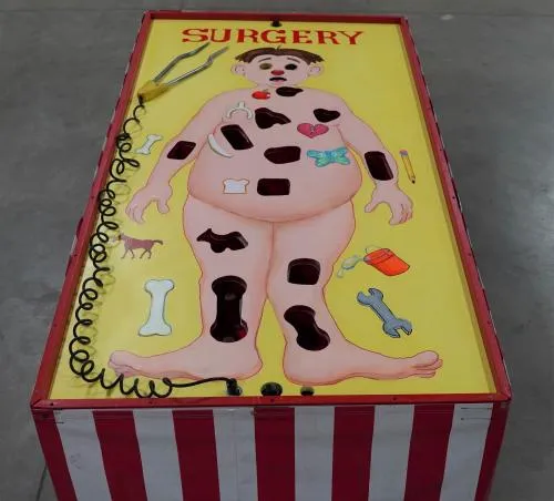 Giant Operation Surgery game rental with a life-sized patient and removable parts for interactive event fun