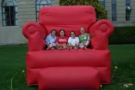 Giant red Big Comfy Chair inflatable photo prop rental from AMJ Spectacular Events in Chicago