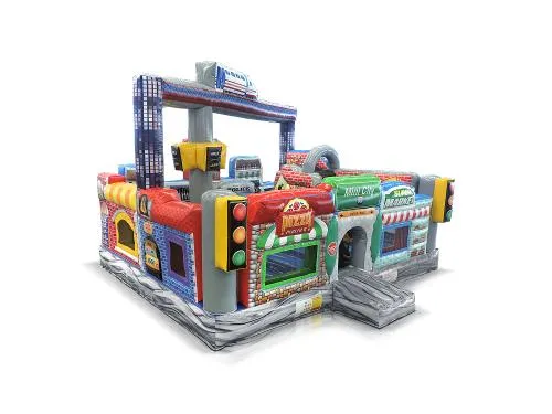 Mini City Playcenter inflatable with themed bakery, jail cells, construction slide, and monorail for young kids