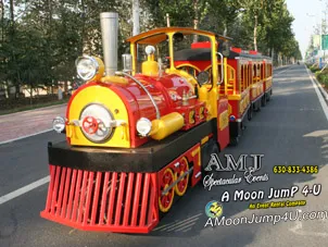 Miracle Express holiday-style electric trackless train rental with engine and coach cars in Chicago