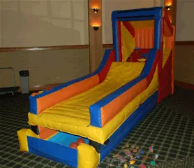 Inflatable Skee Ball game rental with roll-up lane and target hole for Chicago events