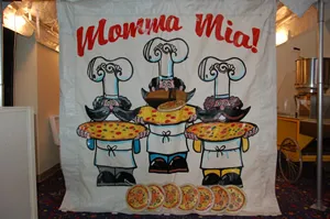 Mamma Mia's Pizza Toss frame game rental with pizza cook target for tossing cloth Frisbees