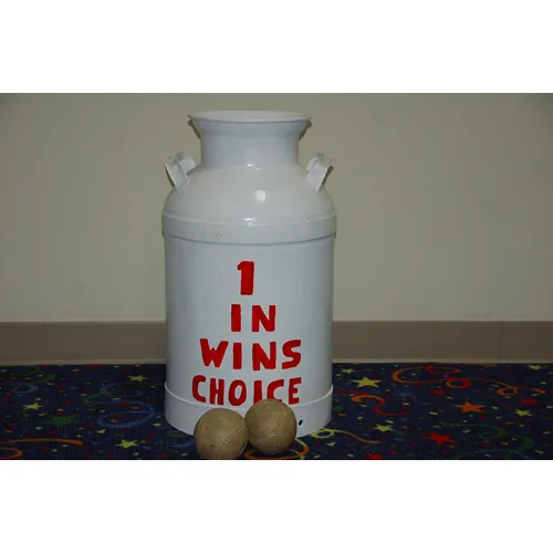 Milk Can Toss Challenge carnival game rental with softballs and milk can from AMJ Spectacular Events Chicago