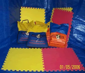 Sand bags and pads used to anchor inflatables on hard surfaces for Chicago events